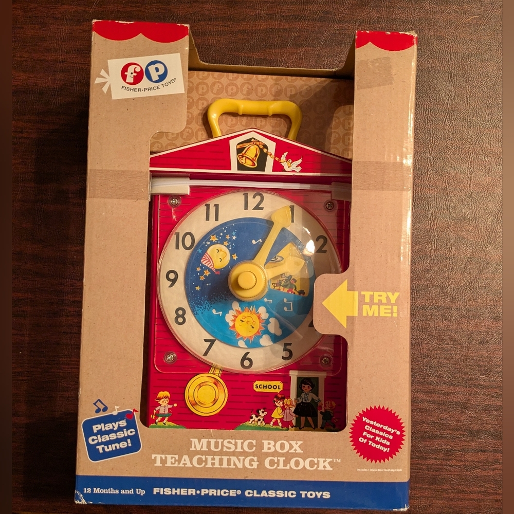 Fisher-Price Music Box Teaching Clock 2012 Edition. Classic Toy NIB